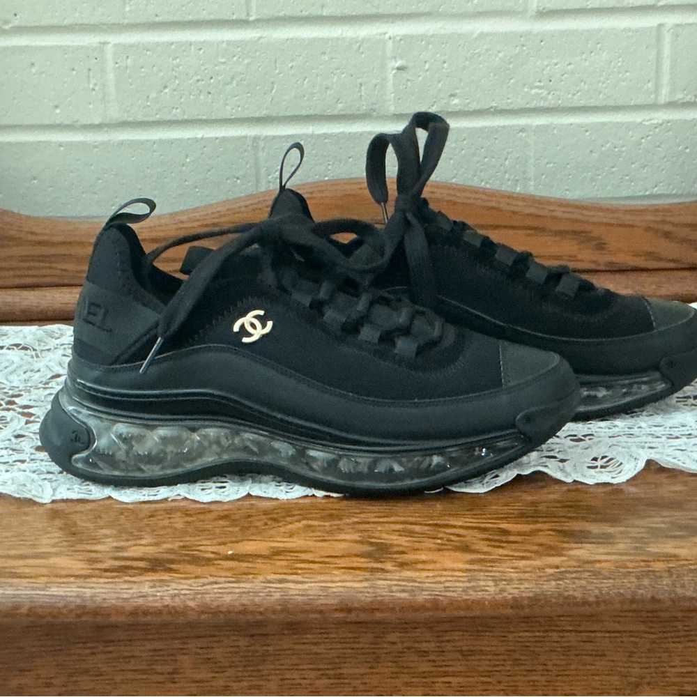 CHANEL Black Women’s Sneakers with Gold Logo
